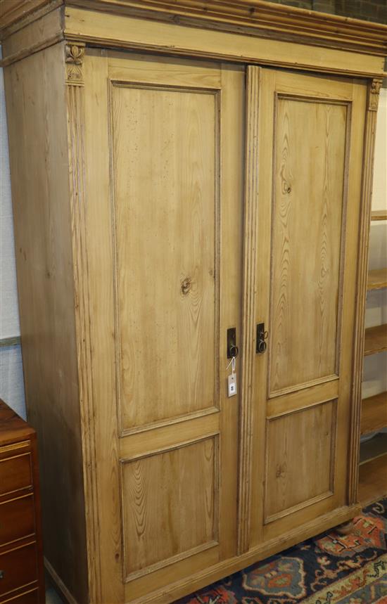 A late 19th century East European pine armoire, W.128cm, D.54cm, H.188cm